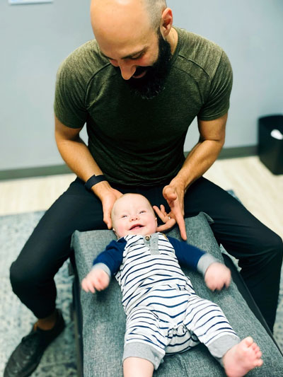 baby and chiropractor