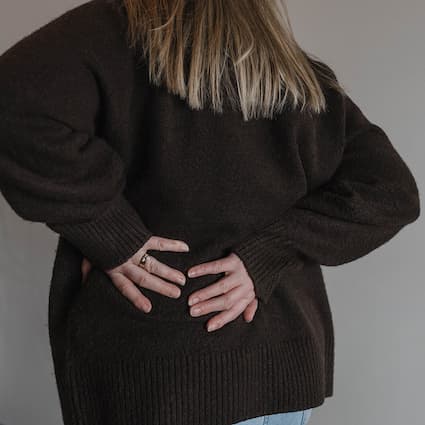 person with lower back pain