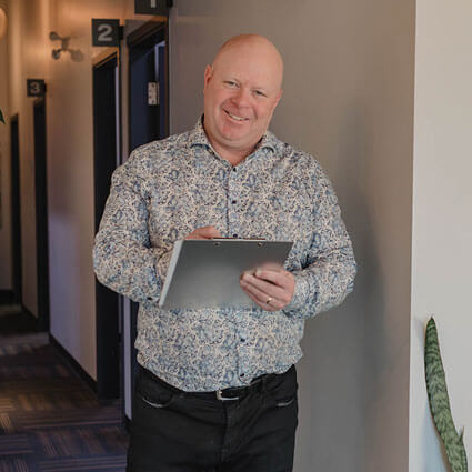 Dr. Pawlovich holding tablet