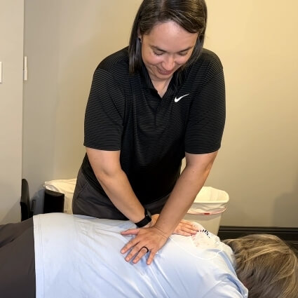 patient having back adjusted