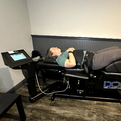 patient on spinal decompression table