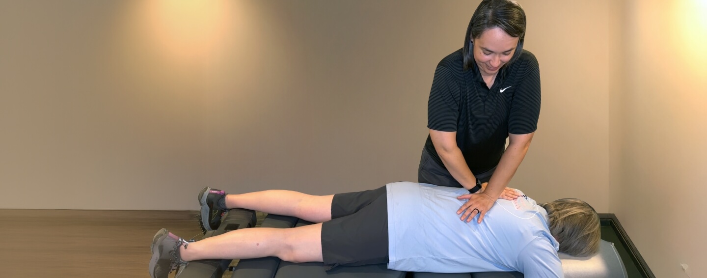 Advanced Chiropractic practitioner adjusting patients back