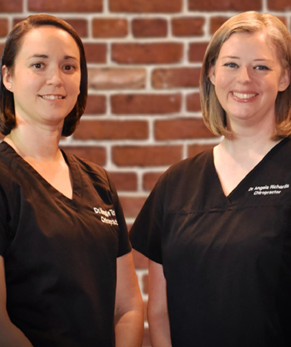 Advanced Chiropractic chiropractors smiling together
