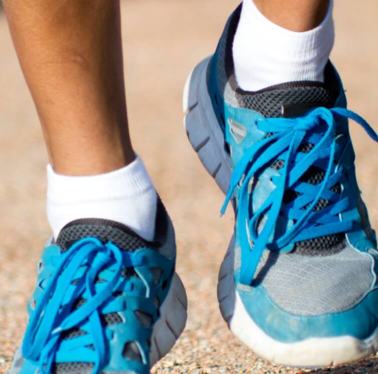 person waering tennis shoes