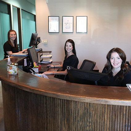 Staff working at front desk