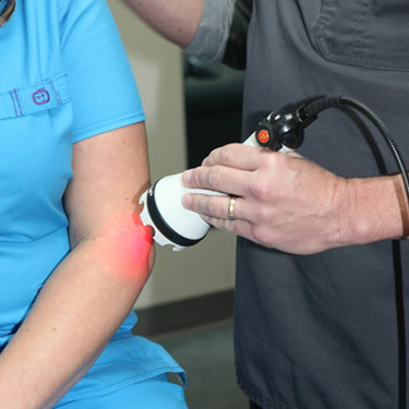 Laser therapy on elbow