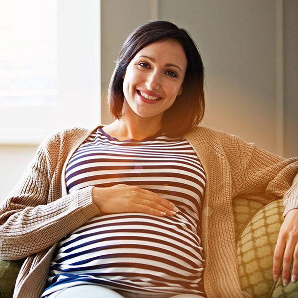 pregnant person smiling