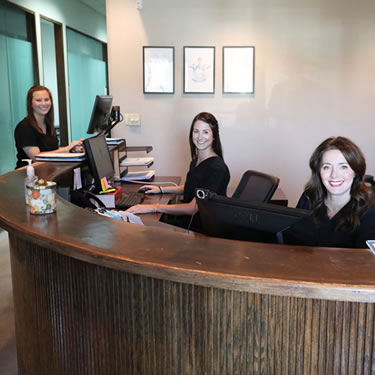 Staff working at front desk