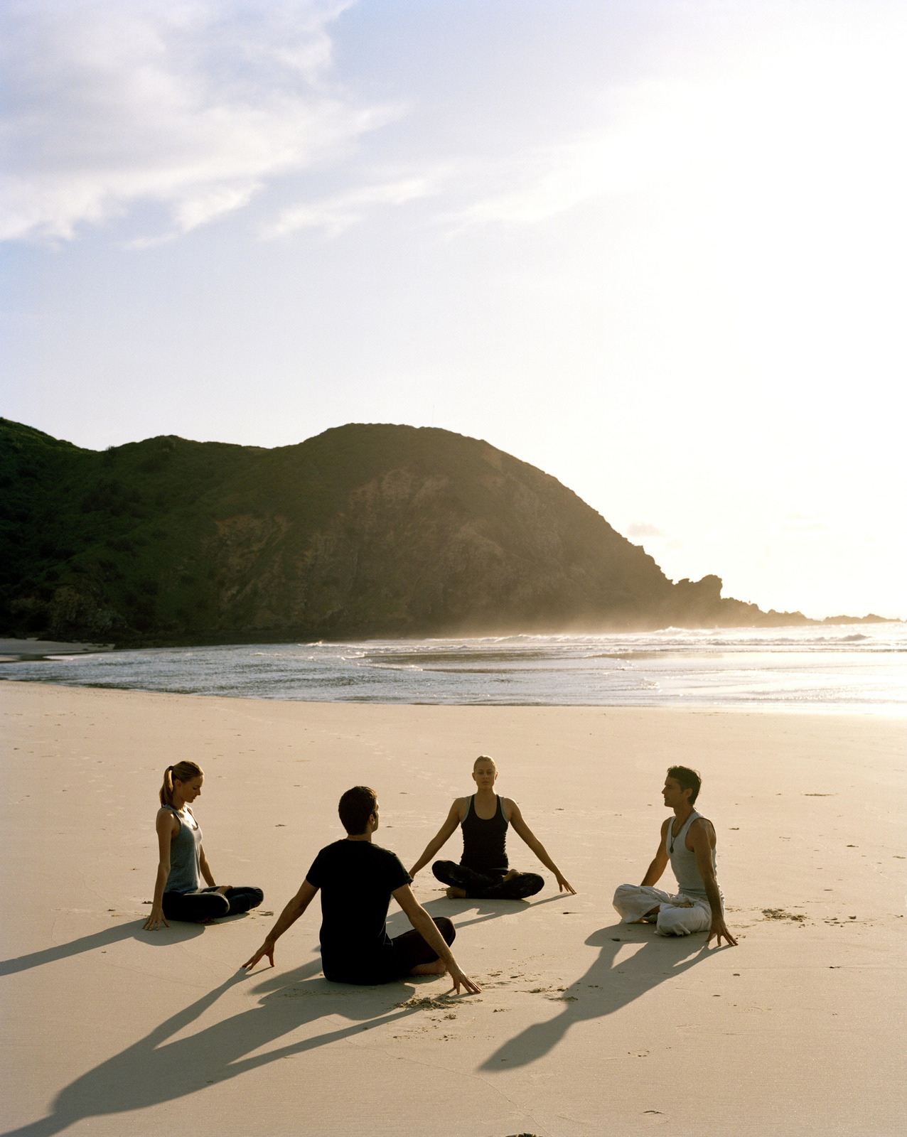 canva-yoga-on-the-beach-MAAgcDdKwH8