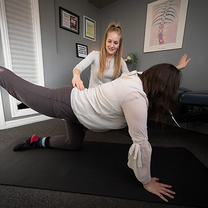 helping a patient stretch