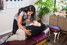 South Granville chiropractor performing adjustment on chiropractic patient in Vancouver