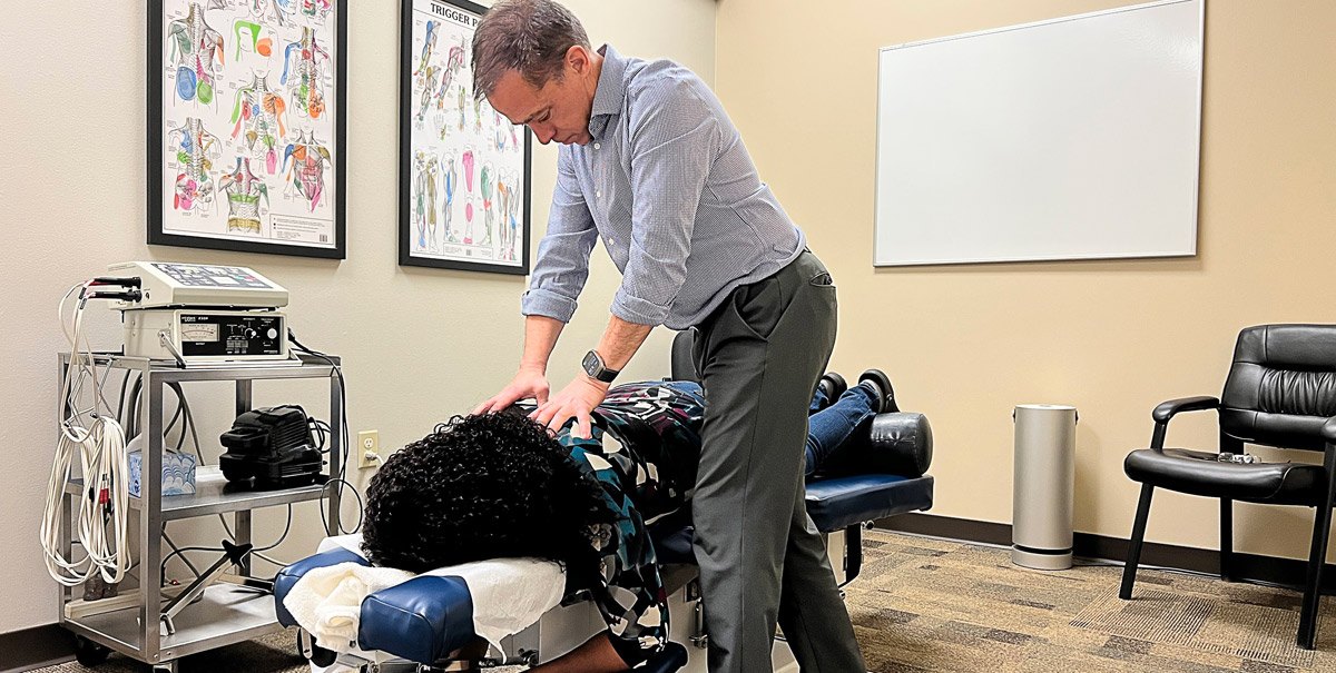 Dr. Eastlund adjusting a patient.