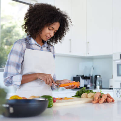 person prepping a healthy meal