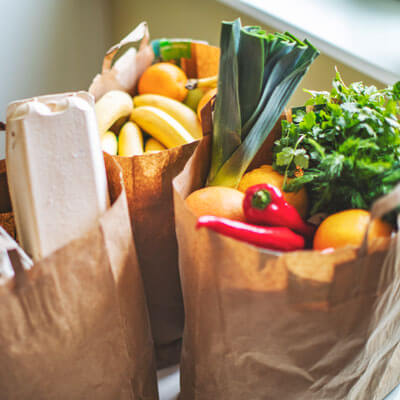 fresh produce in grocery bags