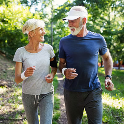 older couple walking outdoor