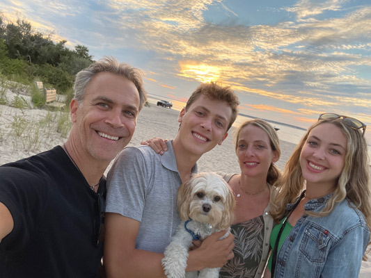 Dr Robert and family at beach