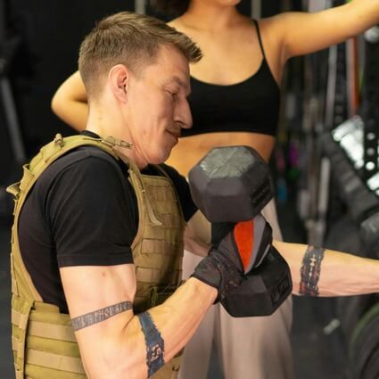 man in weighted vest