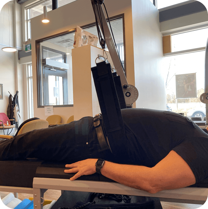 person getting lower back adjusted