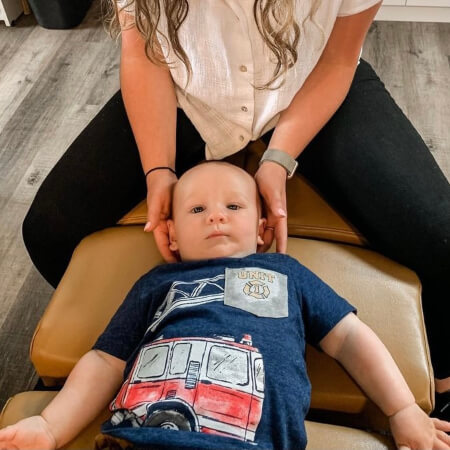 Barrhaven chiropractor adjusting a pediatric patient
