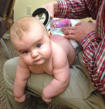 Sturgeon Bay pediatric chiropractor gives baby chiropractic adjustment