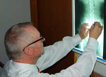 Sturgeon Bay chiropractor evaluates x-rays for chiropractic patient.