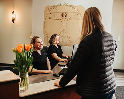 Woman at reception desk