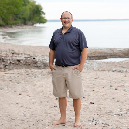 Dr Pat Mccann on beach