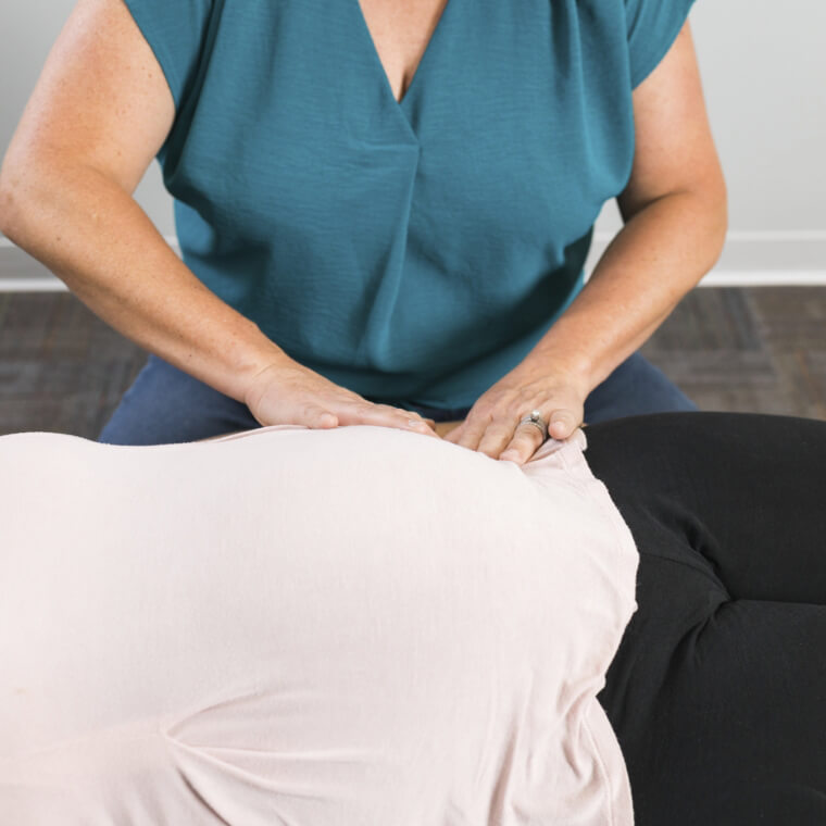 adjusting pregnant woman