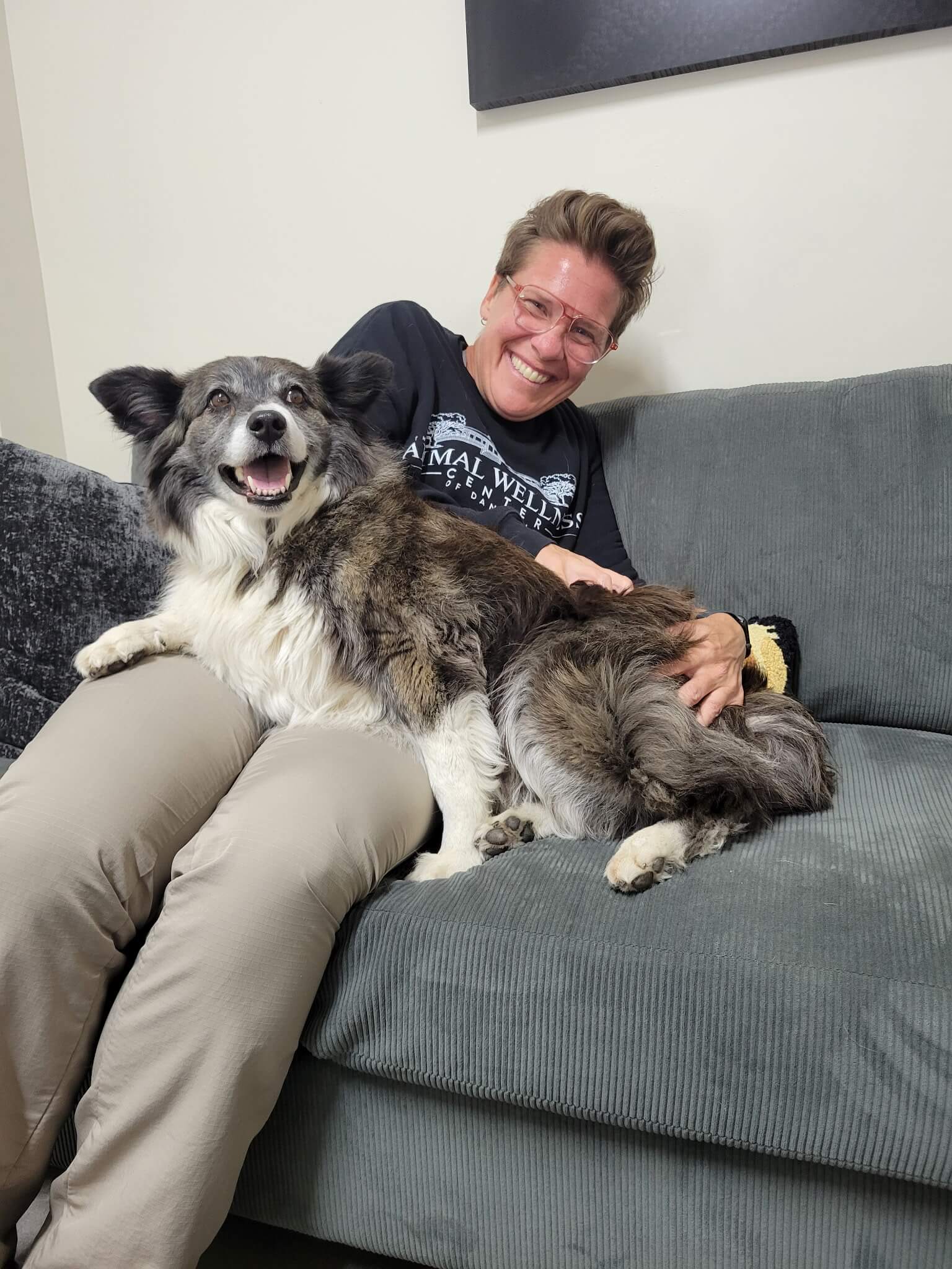 Laney sitting on Dr. Paige lap for her adjustment!
