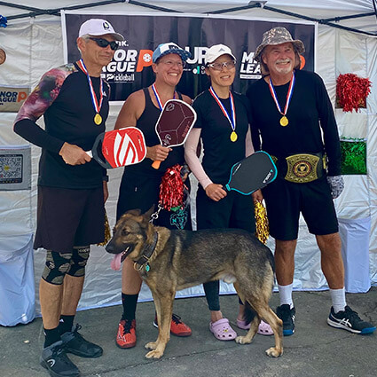 Dr. Paige wins gold with a team MLP pickleball event.