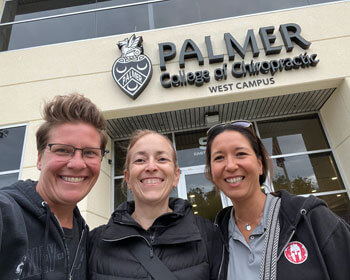 Three doctors outside Palmer