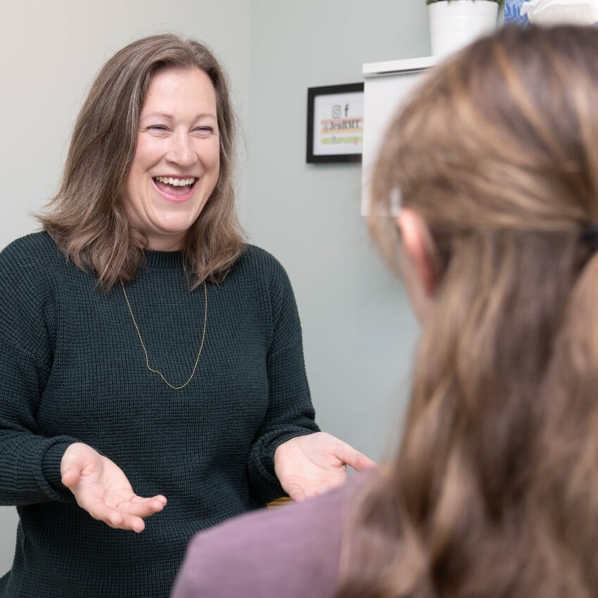 Jen talking with a patient