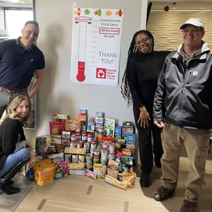 staff with food donations