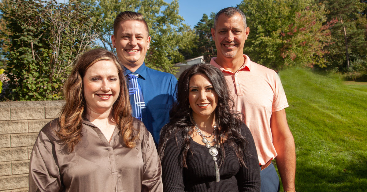 Imperium chiropractic team standing outfront
