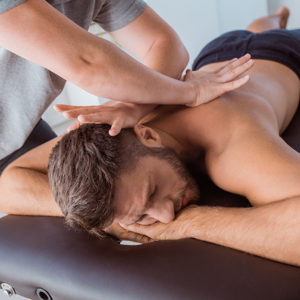 A man receiving an chiropractic adjustment