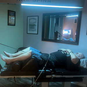 Man having spinal decompression therapy
