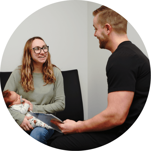 Dr. Rignell talking to patient