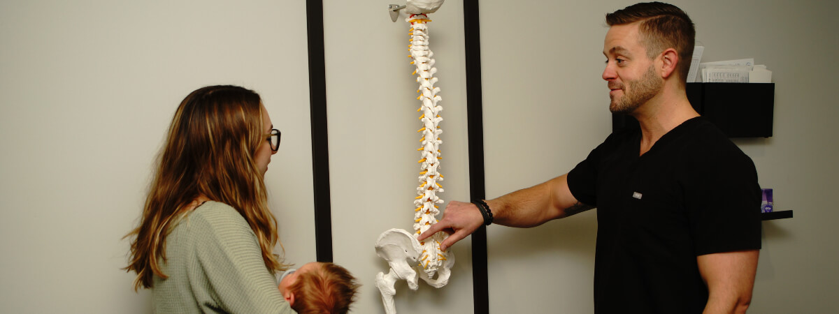 Mankato patient in discussion with a chiropractor