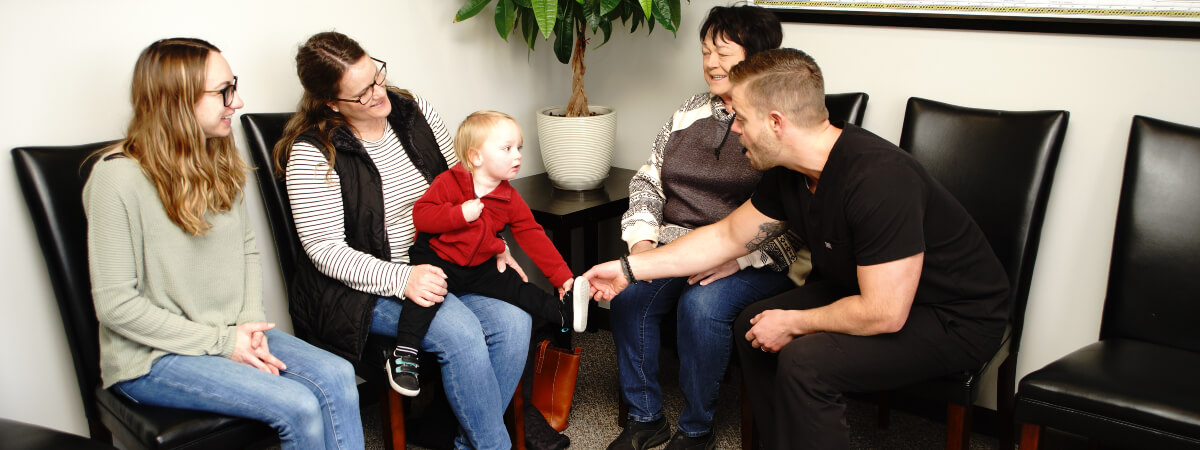 Mankato chiropractor Dr. Brandon interacting with patients