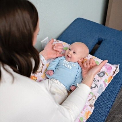 baby being adjusted