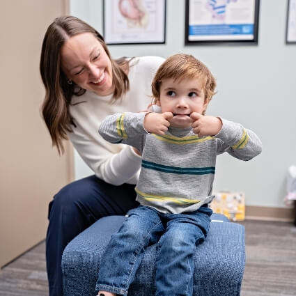 Megan playing with child patient