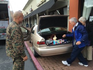 Staff Sergeant  collects toys at Castro Valley Chiropractic