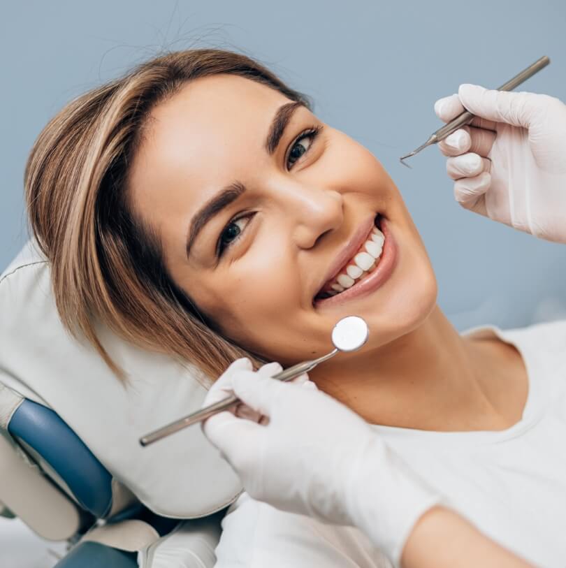 Female patient getting a dental checkup