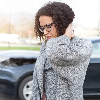 Person with neck pain after an accident