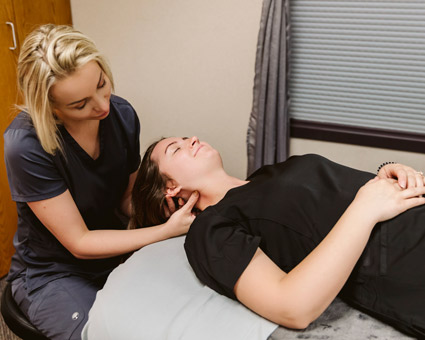 olivia with female patient massage therapy