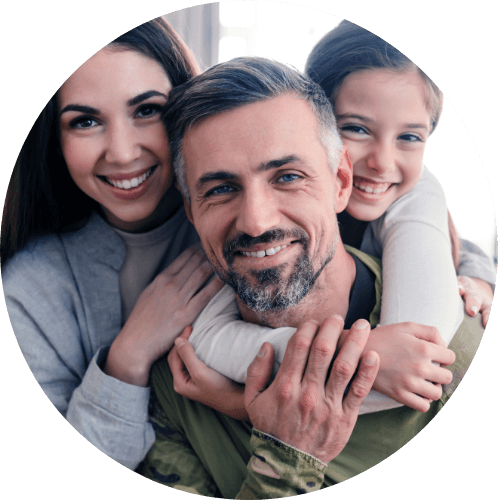 Smiling family of three