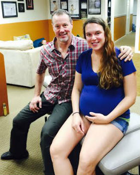 Dr. Scott with pregnant patient