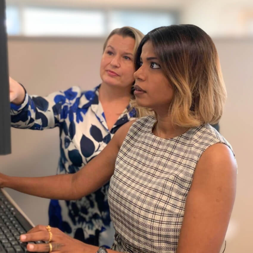 our team reviewing a computer