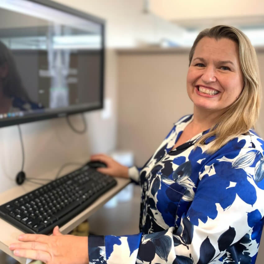 Dr Inge at a computer