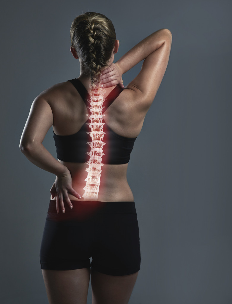 woman with spine illustration on back